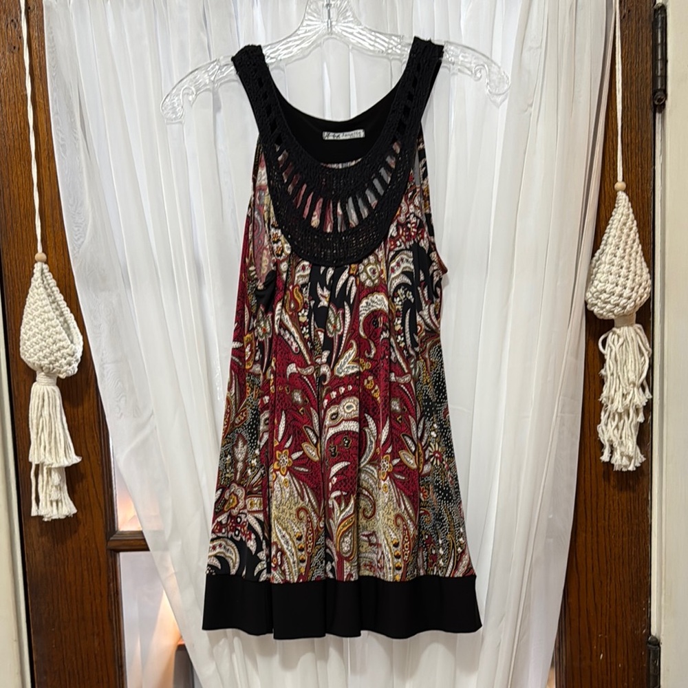 Paisley Print Sleeveless Top with black trim.